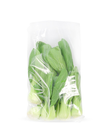 chinese cabbage in plastic bag  on a white backgroundの写真素材