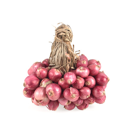 Shallot onions in a group isolated on white background.の写真素材