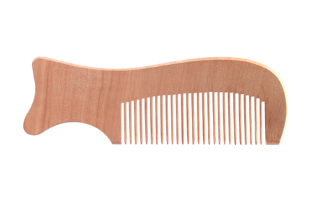 Wooden comb isolated on white background