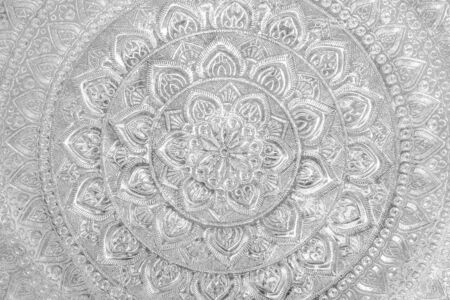 Engraved metal oriental texture/pattern backgroundの写真素材