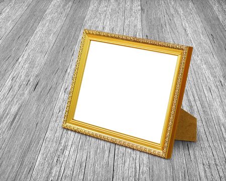 picture frame stand on wood background