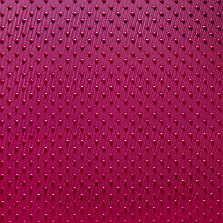 red rubber sheet dot backgroundの写真素材