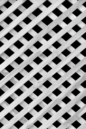 texture of white slat wall isolated on black backgroundの写真素材