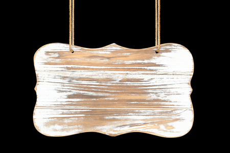 close up of an empty wooden sign hanging on a rope on black backgroundの写真素材