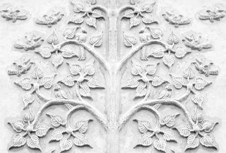 Stucco wall in temple in Thailandの写真素材