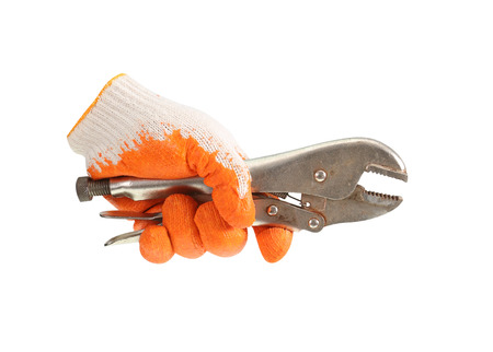 Working hand in glove holding wrench on a white background