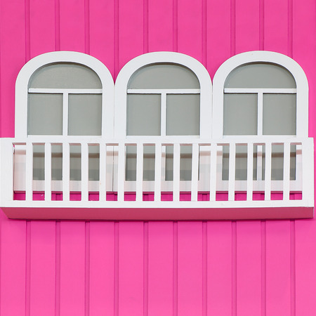 window of the House in a colored exteriorの写真素材