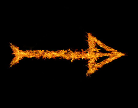 Flaming arrow grow up isolated on black backgroundの写真素材