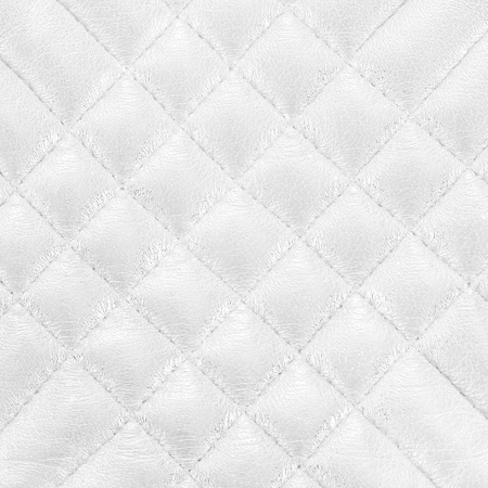 white leather texture colose-up with linear stichesの写真素材