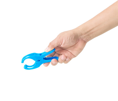 plastic clip or clamp with hand isolated on white background
