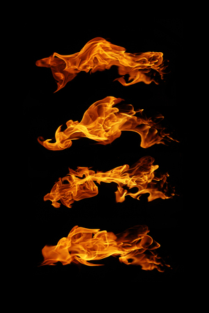 Fire flames collection isolated on black backgroundの写真素材