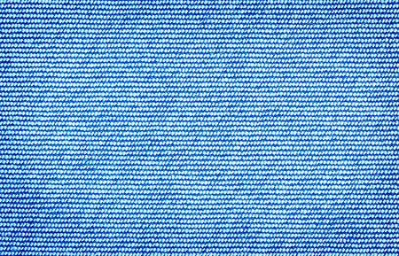 Close up texture of blue jean or denim fabric inside outの写真素材
