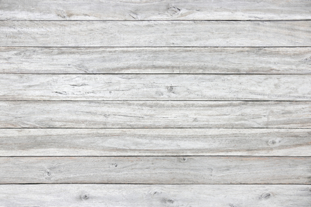 White or gray wood wall texture with natural patterns backgroundの写真素材