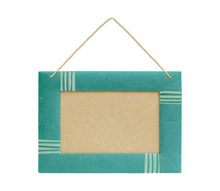 close up of empty paper sign or frame and rope hang isolated on white background