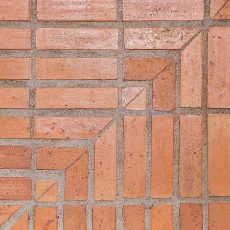 Close Up of a Red Exterior Brick Wall corner style texture background