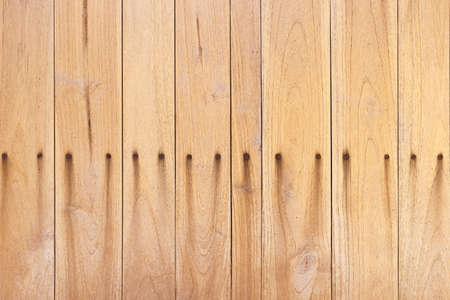 wooden wall with stain rust from old screws texture backgroundの写真素材