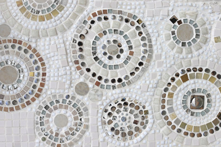 The cement walls are decorated with glass and tile  texture backgroundの写真素材