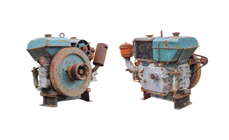 Old rusty motor diesel engine isolated on a white backgroundの写真素材