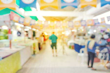 Blur image of People shopping at market Defocused blur backgroundの写真素材