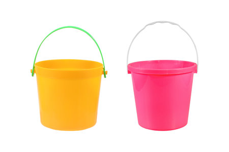 Two empty pink and yellow plastic household bucket  isolated on white background  with clipping path include for design usage purpose.の写真素材