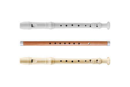 white plastic flute and wooden flute isolated on white background ,clipping path included use for design.の写真素材
