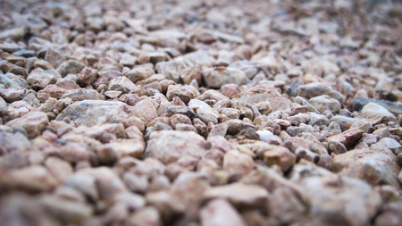 Stone in the lake edge blurred.can be used as background.の写真素材