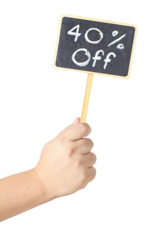 Hand raising a blackboard 40 percent sale  isolated on white backgroundの写真素材