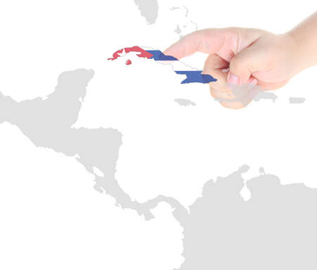Finger touch on  Cuba map flagの写真素材