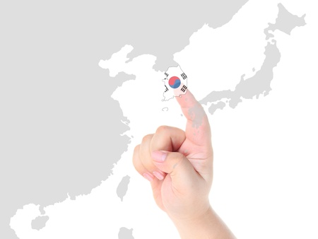 Finger touch on South Korea map flagの写真素材