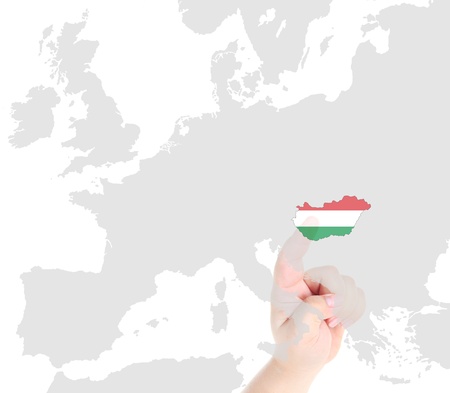Finger touch on Hungary map flagの写真素材