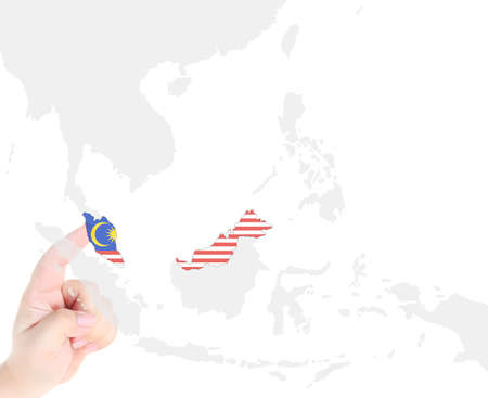 Finger touch on Malaysia map flagの写真素材