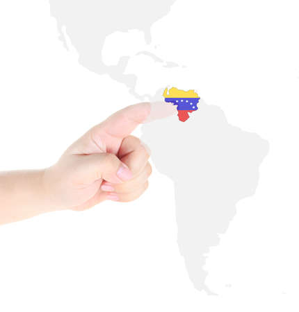 Finger touch on Venezuela map flagの写真素材