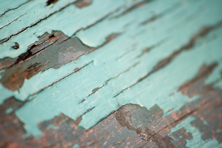 Decay and aged wood painted in green colorの写真素材