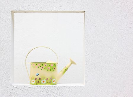 Cute colorful yellow vintage water canの写真素材