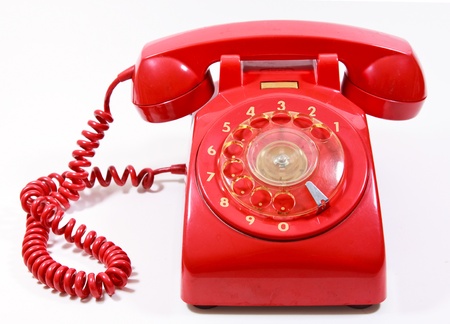 Classic 1970 - 1980 retro dial style red house telephoneの写真素材