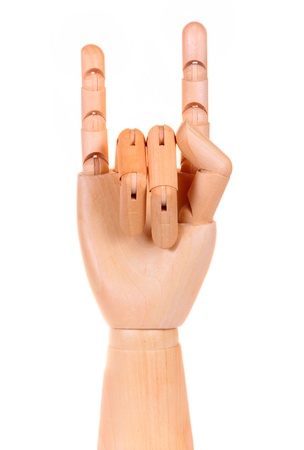Wooden dummy hand love sign isolated white backgroundの写真素材