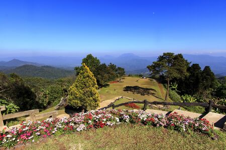 Mountain resort with flower garden in bright blue skyの写真素材