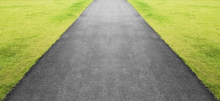 Road and green grass background の写真素材