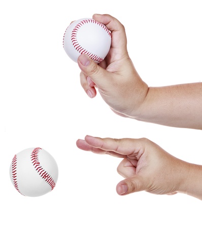 Hand throwing baseball isolated on white background の写真素材
