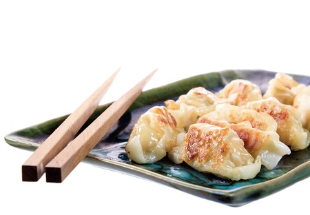 Japanese gyoza dish isolated on white background の写真素材