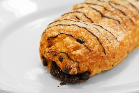Chocolate bakery isolated on white plate の写真素材