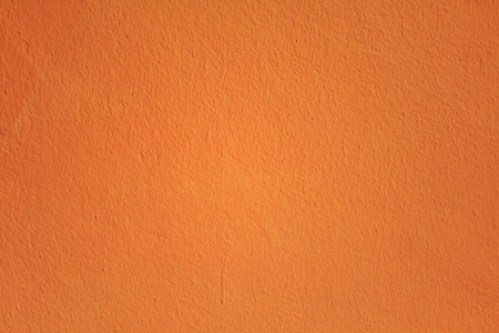 Orange cement wall texture backgroundの写真素材