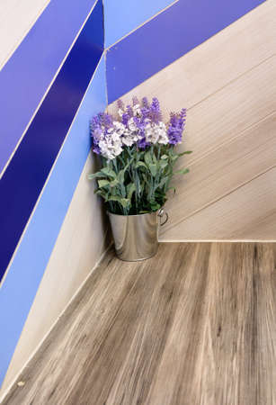 Artificial flower on wooden barの写真素材