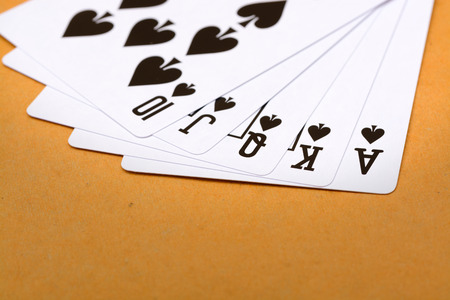 Black spade royal straight flush poker card