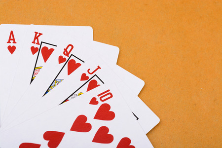 Red hearts royal straight flush poker card