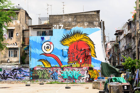 Bangkok, THAILAND, 26 SEPTEMBER 2014, Graffiti art painted on old abandon building in downtown, Ratchathewi districtのeditorial素材