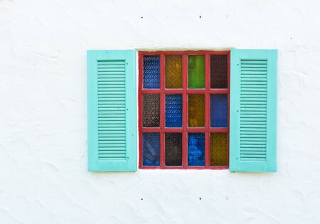 Wooden window on white wallの写真素材
