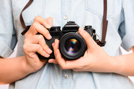 hand holding vintage cameraの写真素材
