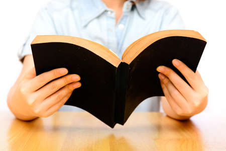 Asian woman reading book