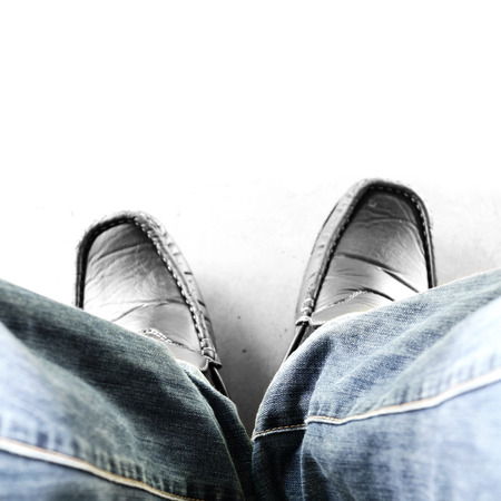 top view man with jean sittingの写真素材